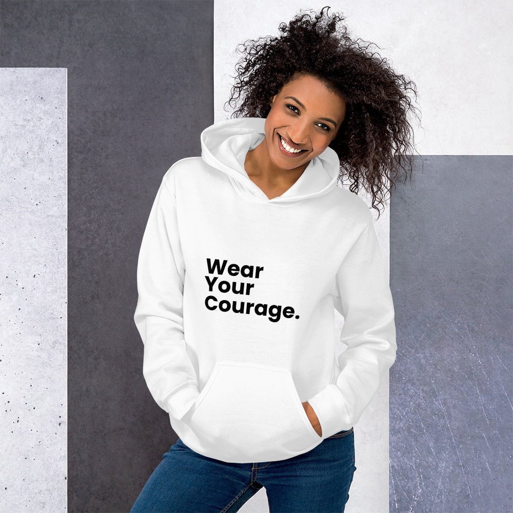 Woman wearing a white hoodie with 'Wear Your Courage' text against a gray and white background