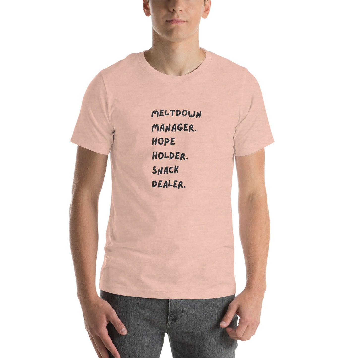 Person wearing a pink t-shirt with text on a white background