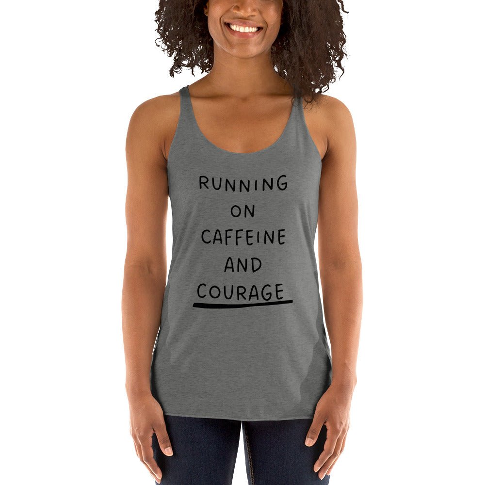 Woman wearing a tank top with 'Running on Caffeine and Courage' text