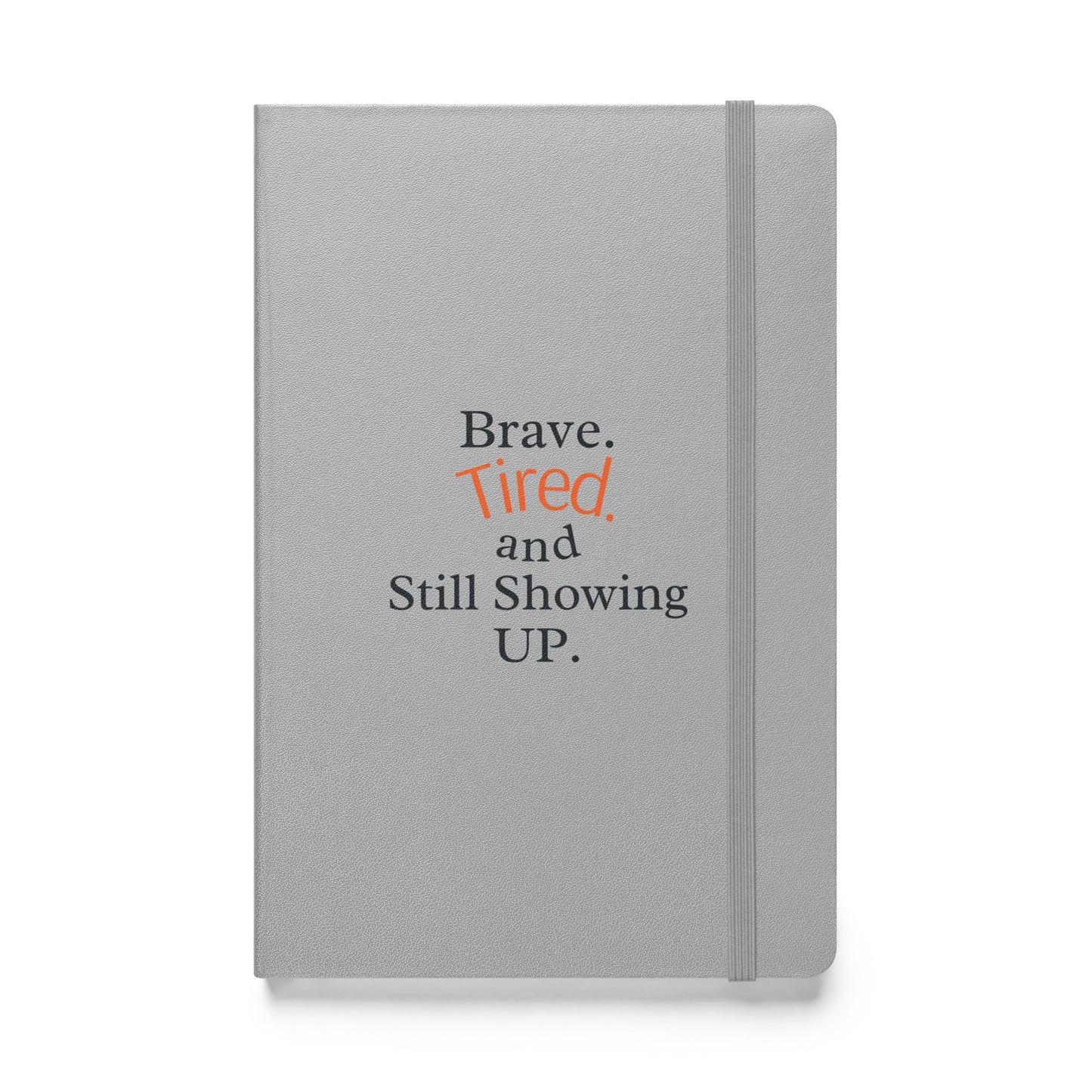 Gray notebook with motivational text on a white background