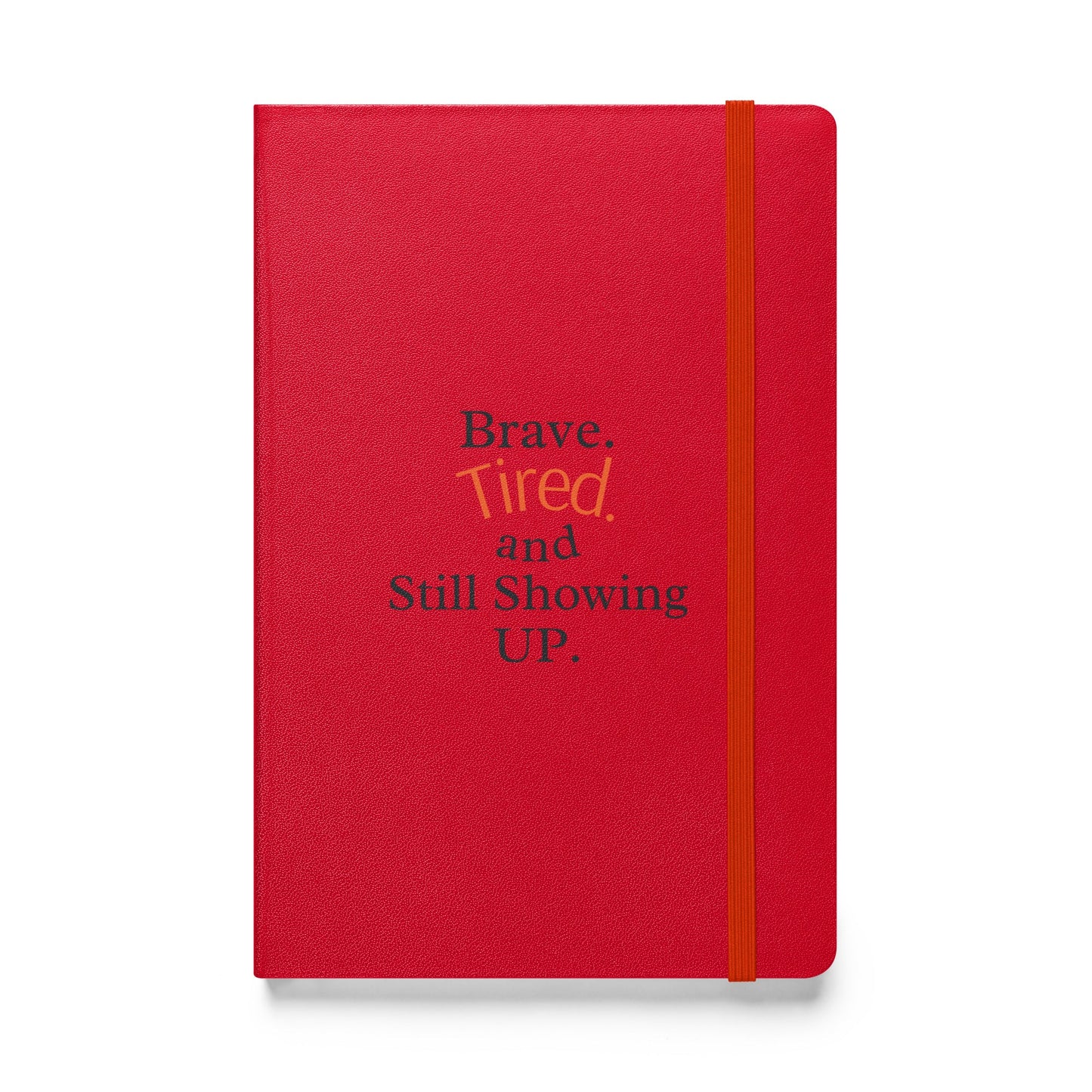 Red notebook with motivational text on a white background