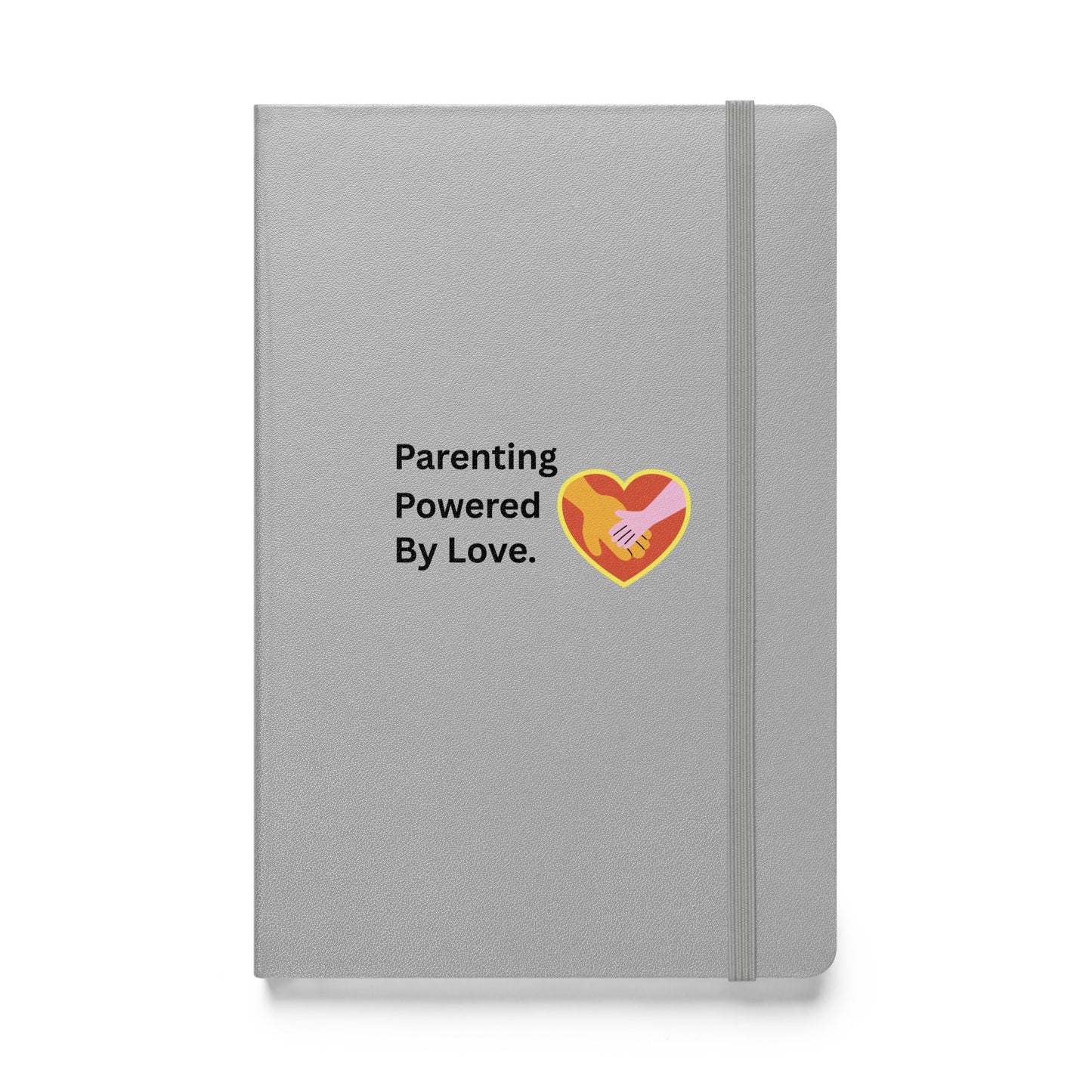 Gray notebook with 'Parenting Powered By Love' text and heart design on a white background