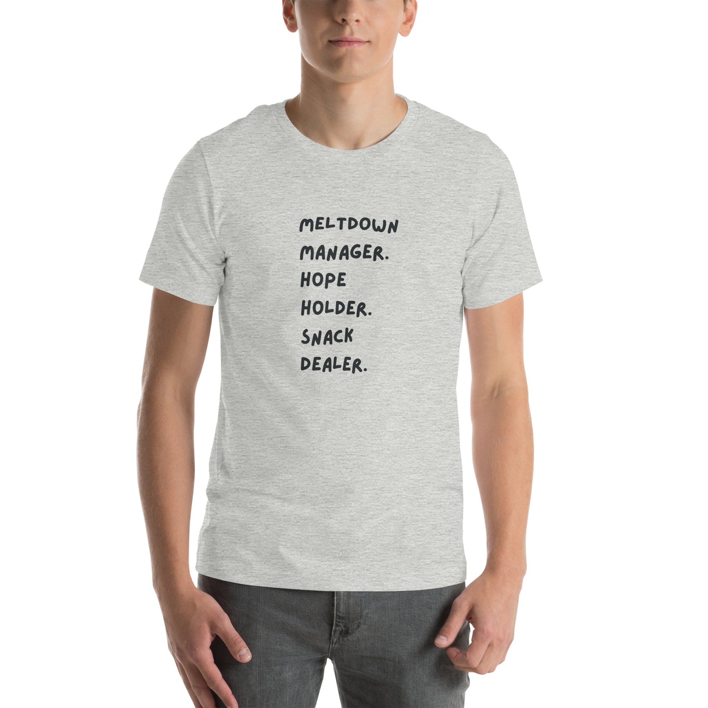 Person wearing a gray t-shirt with text on a white background