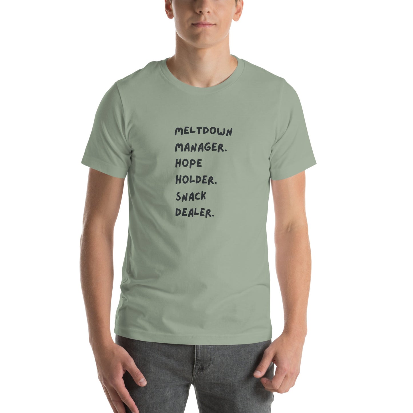 Person wearing a light green t-shirt with text on a white background