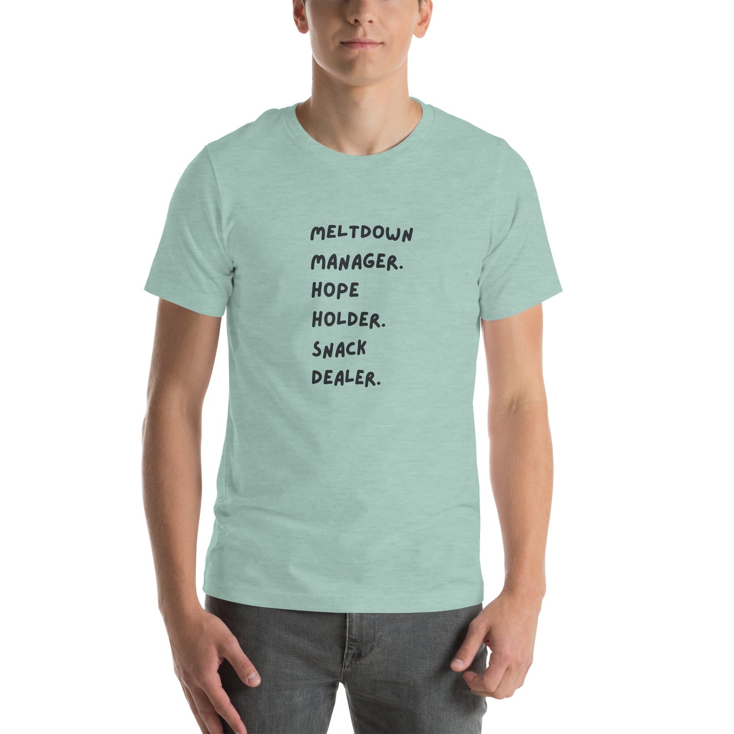 Person wearing a light green t-shirt with text on a white background