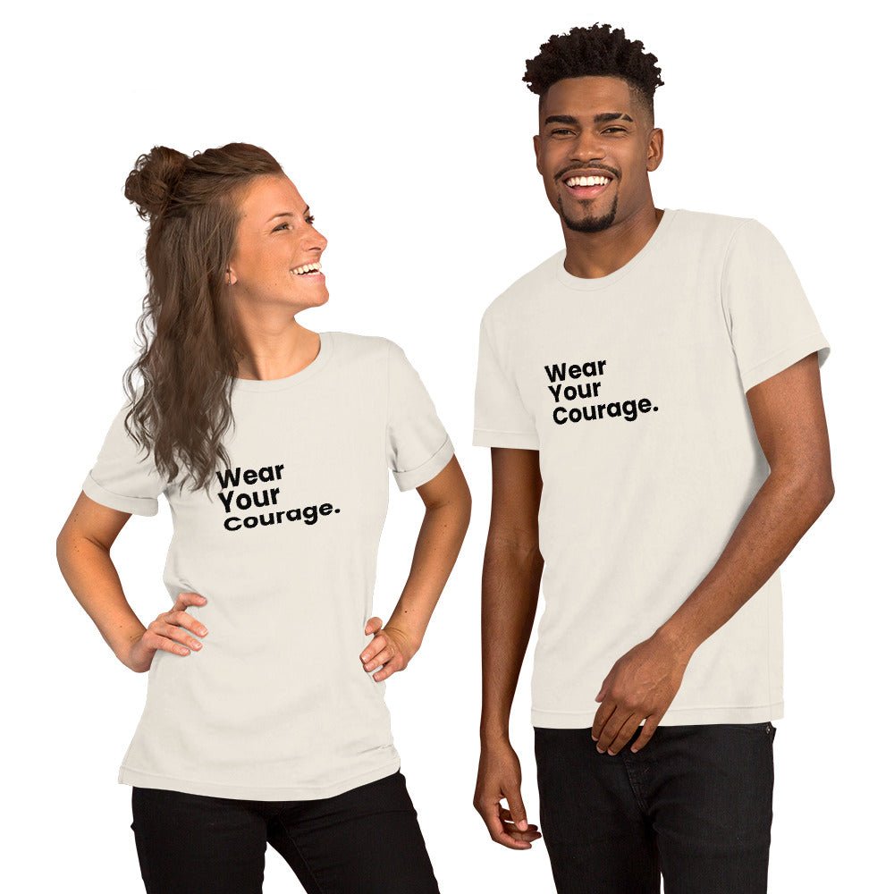 Two people wearing white t-shirts with 'Wear Your Courage' text on a white background