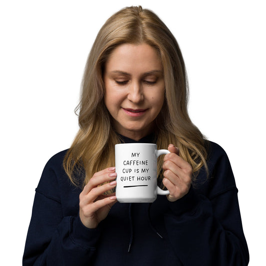 Woman holding a white mug with text on a white background