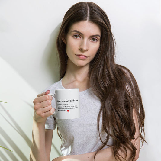 Woman holding a mug with text on a white background