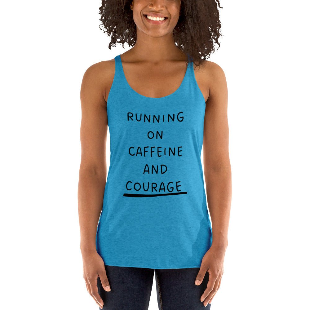 Woman wearing a blue tank top with text 'RUNNING ON CAFFEINE AND COURAGE' on a white background