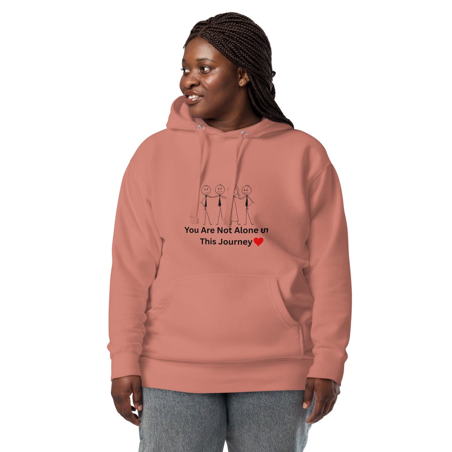 Person wearing a pink hoodie with a motivational message on a white background